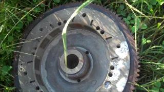 How to remove outboard motor flywheel without a puller