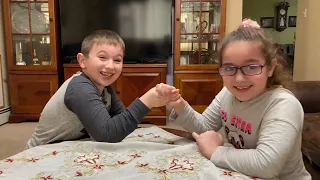 Kevin 7 years & Sara 5 years old arm wrestling. ￼