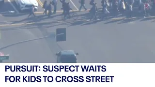 Police pursuit involving armed suspect in the Los Angeles area