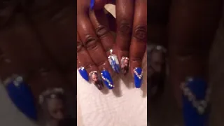 Nipsey Hussle themed nails 💙🏁💙🏁👑