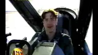 Brendan Fraser by the jet plane