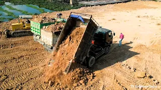 The Good Work of The 5 Ton Truck Team And Bulldozer To Fill The Lake