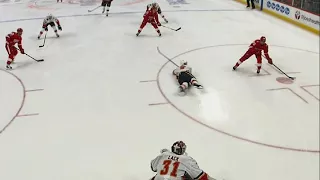 Red Wings' Athanasiou tries to pass, scores instead