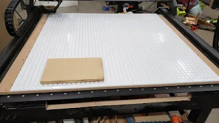 CNC vacuum  table! This table is dead simple and you can make it any size you need.