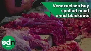 Desperate Venezuelans buy spoiled meat amid blackouts