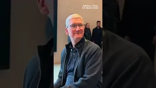 Apple CEO Tim Cook appears at the Apple Store in Sanlitun, Beijing