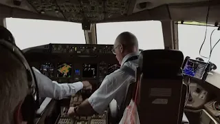 777 cockpit view/With ATC audio… NGO-LAX-through dissipating tropical storm ( push to top of climb )