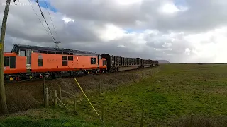 Class 97 DAVE BERRY 97304 & 37405 hauling a log train out of Aberystwyth through Borth  24/03/23