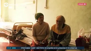 Что говорит ставшая символом пропаганды «бабушка с красным флагом»