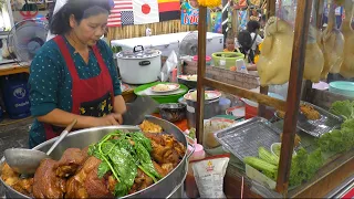 Thai Street Food in Bangkok. Grilled Meat, Fish and more Food at Talad Neon Night Market. Thailand