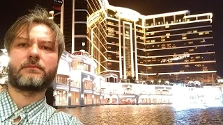 Wynn Palace Macau Performance Lake in the morning with rainboiw. Top view. Remake