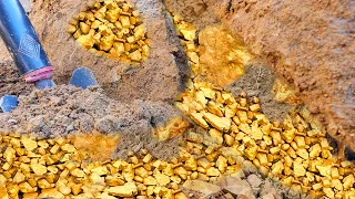 wow lucky today! digging gold treasure under stone at mountain near the river side, mining exciting