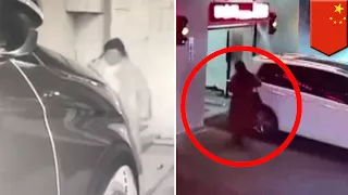 CCTV footage shows phone-addicted woman walking into parking garage and getting trapped - TomoNews