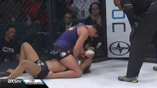 Ashlee Evans Smith punches Fallon Fox while FORCES plays