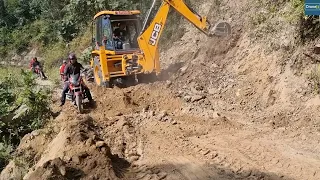 Clearing Hill--Slide Blocked Road Dirt with JCB Backhoe