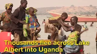 Thousands cross lake into Uganda to escape fighting in DRC's Ituri province
