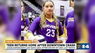 Volleyball player who lost both legs after being hit by car returns home
