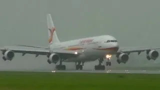 A340 SLM PZ-TCP Super wet landing at AMS Schiphol