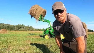 John Deere 3025D with Round Bales