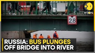 Russia: Bus careens through bridge Barricade, crashes into river | Latest News | WION