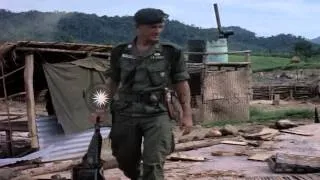 US Army Captain Roger Donlon of Special Forces walks through debris after a Viet ...HD Stock Footage