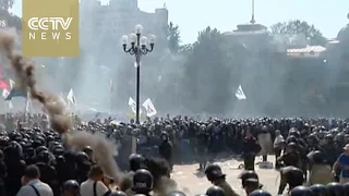 Police officer killed, dozens injured in blast outside Kiev parliament