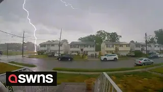 Doorbell camera captured the moment a man was struck - by bolt of lightning | SWNS