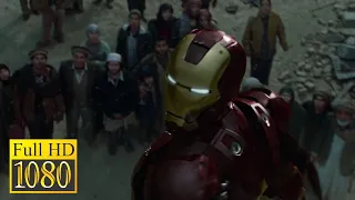 Iron Man saves a village in Afghanistan from terrorists in the movie IRON MAN (2008)