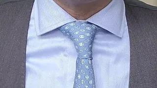 Tie a school tie in under a minute. Quick and easy school tie tutorial.