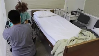 SKILL 22— TRANSFERS FROM BED TO WHEELCHAIR USING TRANSFER BELT CNA Skills Test Pearson Vue Credentia