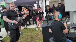 Caleb Hayes and Mick (Dead Label) jamming Slipknot 'Before I Forget' Bloodstock 2023