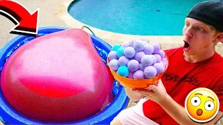 PUTTING 100 BATH BOMBS IN A 6FT WATER BALLOON!