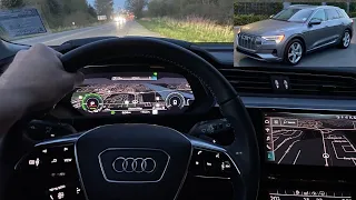 The all electric Audi e-tron Quattro. POV - quick night drive. PROGRESSIVE