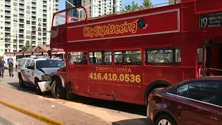 Tour bus, police cruiser involved in crash on Queen's Quay