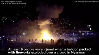 Hot air balloon full of fireworks explodes over festival