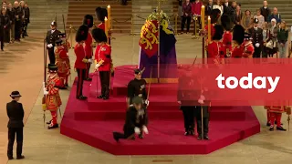Royal guard collapses next to Queen’s coffin on first night of lying in state