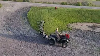 Minion mower rig mowing the front bank