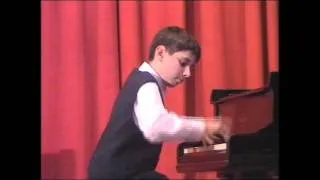 10 year old kid playing his own arrangement of Star Wars