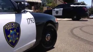 VIDEO: Scene of armed standoff on East 24th St in #Oakland. @oaklandpoliceca SWAT team on scene.