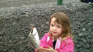 Little Girl Catches Fish