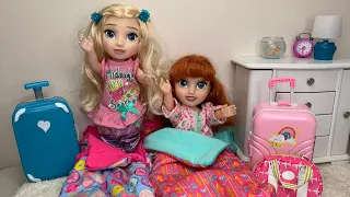 Elsa And Anna toddlers Packing their bags for a Sleepover