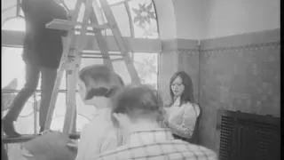 Christmas decorating of a church window, 1968-12-11