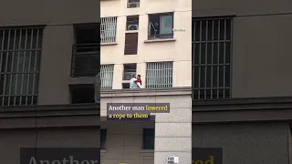 Chinese man scales building to rescue toddler #shorts