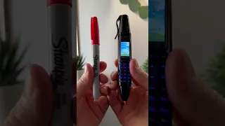 Mini Phone and a Ballpoint pen.