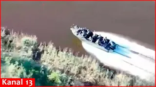 Russians trying to go ashore by boat on Dnipro River are targeted by a Ukrainian drone