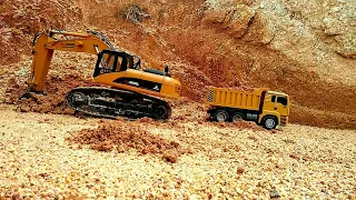 rc excavator Dump truck at work on mountain