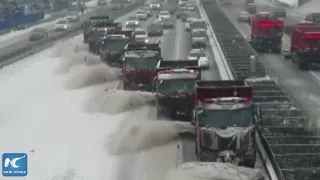 Cool! Giant snow plows clear road in NE China