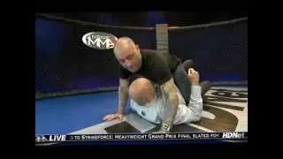 Rogan demonstrating taking the back with Bas Rutten