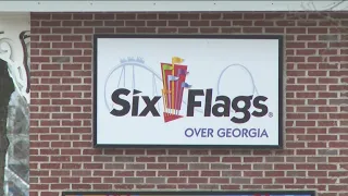 Latest after teen shot by officer near Six Flags Over Georgia in chaotic park clearout due to fights