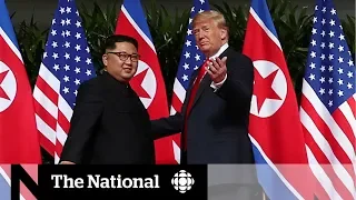 Singapore summit: Trump and Kim meet in historic moment